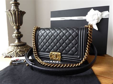 chanel le boy black with gold hardware|chanel bag.